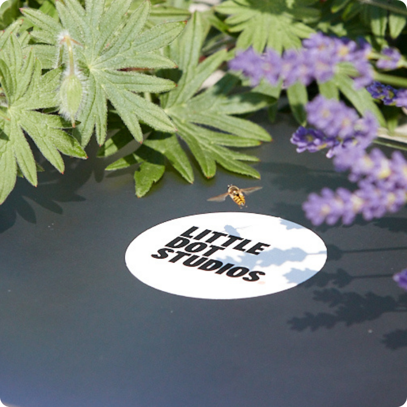 bee logo lavendar zoomed